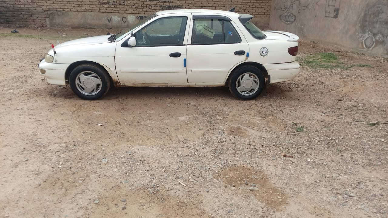 سلام عليكم كيه سيفيا موديل 96 رقم دولي بغداد بسمي سنويته 2031 صدر تخم تاير محرك وكير شرط مال حاويه بل جيس كهربائيات كله شغاله مكفوله كفاله من اي طخه من الدعاميه لدعاميه  السياره مال جناي الاستفسار *********** مكان السياره سامراه
