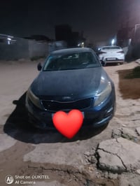 عندي سيارة اوبتما  موديل 15  وارد امريكي  رقم سيارة بغداد مراوس ماريد ...