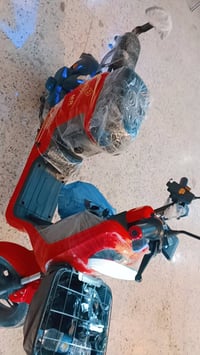 دراجة كهربائية • بالكرتون • ضمان بطاريات