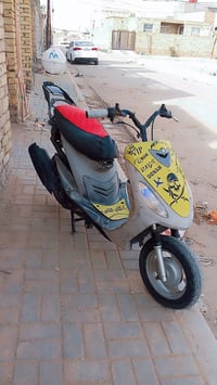 دراجه بوشه 55     مكاني شارع 30 دوانيه،،،07864657237