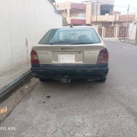 سياره نيسان براميره بس كير بي صفنه سعر على رقم 07731020028