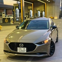 مازدا 3 مۆدیل 2024 فول مواسەفات ڕەنگ خاکی ناوازە  سڵاید ،شاشە،کامێرە، ...