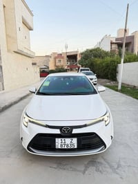 كورلا هايبرد 2025 ماشية 28 كفالة عامة السعر 155 مكاني بغداد زيونة  077...