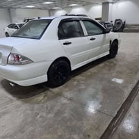 لانسه ر مودیل‌2011مه‌کینه گه وره گی‌ر و مه کینه لوک بی عه یب و به شه ر...