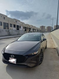 MAZDA 3 hatchback 2024 07708604626  مواسەفات: بەصمە و سلاید شاشەو کامێ...