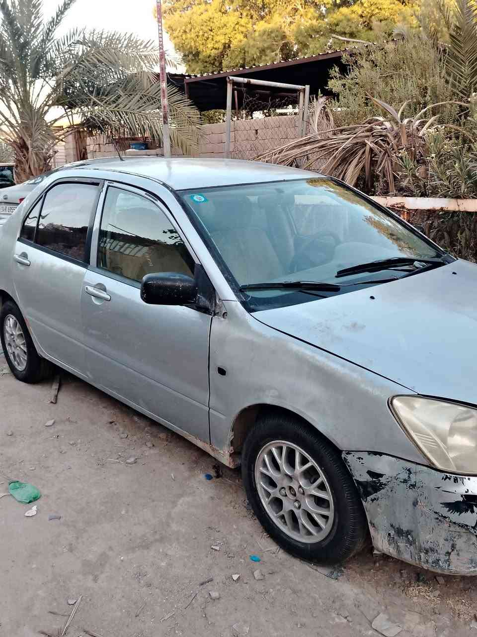 لانسر ٢٠٠٧ سياره جاهزه تخم تاير رقم انكليزي تبريد شغال السعر 40 رقم التلفون ***********
