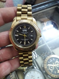 رولێکس • ساعة