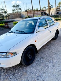 بروتون 2002 كير عادي رقم بغداد بسمي صدر جديد كهربائيات كلها شغاله محرك...