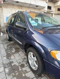 من رخصه مدير الگروب للبيع دوج كرفان موديل ٢٠٠٦ رقم بغداد الماني سنويه ...