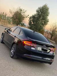 فیوژن SE • ٢٠١٧ • أسود