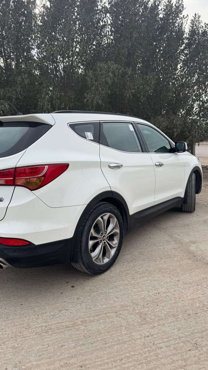 هيونداي سنتافي 2013 وارد خليجي فوول واحد على واحد رقم بغداد انكليزي بسمي سنويه لل2030
 بيه قبق جنطه صبغ وشويه بارد بالجاملغ الخلفي
مواصفات:
-مكينة 6 سلندر  3300
-بصمة تشغيل وبصمة ابواب
-بانوراما طكتين
-7 راكب + 3 قطع تبريد
-تدفئة تبريد كشنات
-خزن كشنات ميموري 
-مانع انزلاق + مانع انحدار
-فور ويل 4*4
-تحكمات ستيرن 4 جهات
-مري شفط + مري قلاب 
-نظام eco الاقتصادي
-سايد بريك دكمه + Auto hold
-بال 120 تدك جرس
-ستيرن 3 وضعيات normal..sport..comfort
-بردات خلفية بلاد
-لايت زنون بلاد
-ترحيب عند الاقتراب 
-كشنات جلد قرميدي + اني مخلفهن
-ثلاجه بالجكمجه
-زراك لايت +دبل كشاف
-الكشنات الاماميه كهرباء
-شاشه بيه GPS و بلوتوث وكامره اصليه
شادله باتري جديد ودبلات و دسكات امامي وخلفي جدد وفيت بم جديد مكينه بلاديه
شادلها تخم تايرات جديد
سياره ما عايزه شي مال جناي 
مكاني بابل الهاشمية
 #سعررر 179 $ وبيها مجال
***********
*********** هاشمية, بابل
