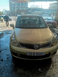 اخوان نيسان فيرسا موديل 2009رفم بغداد بااسمي هزه جديده مصبوغه حزام حلو...