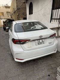 كورلا 2025 هايبرد  شكل الخليجي 💯  مرقم بغداد وجاهز مثبت لوحات وسنويه ب...