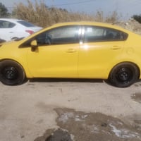 كيا ريو خليجي 2015 رقم بغداد انكليزي تبريد تدفئه  فول مواصفات كير محرك...