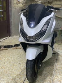 PCX جيل رابع وراد كوري لون ابيض صدفي   دراجه جديده كلش محرك بل كارتون ...