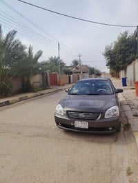 اوبتما ٢٠٠٨ محرك ٢٠٠٠ معجون قماره وتكم شواصي سليمه مكفوله من الگص سيار...