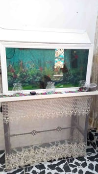 حوض سمك ارتفاع 50 ولوجه 90   سعره 100    07872377933 بي واتساب