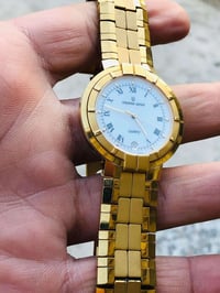 يونيفرسال جنيف • تغليف ذهب • قطر ٣٥مم